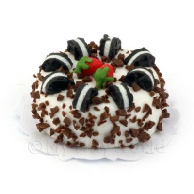 Miniature Iced Cake With Oreo Cookies and Chocolate Fl