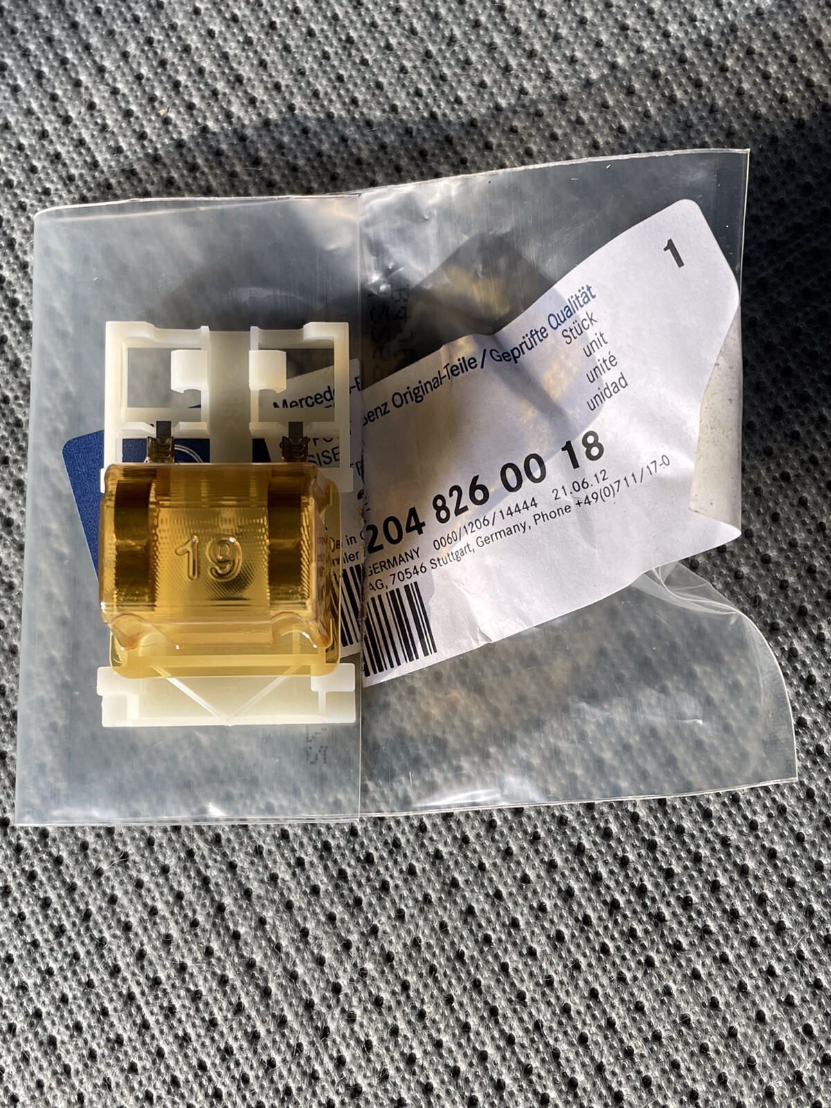 Soporte de contacto para visera MercedesBenz A2048260018 W204 genuino