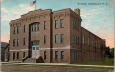 1914 Jamestown, North Dakota Postcard "Armory" Building Street View Bloom Bros.