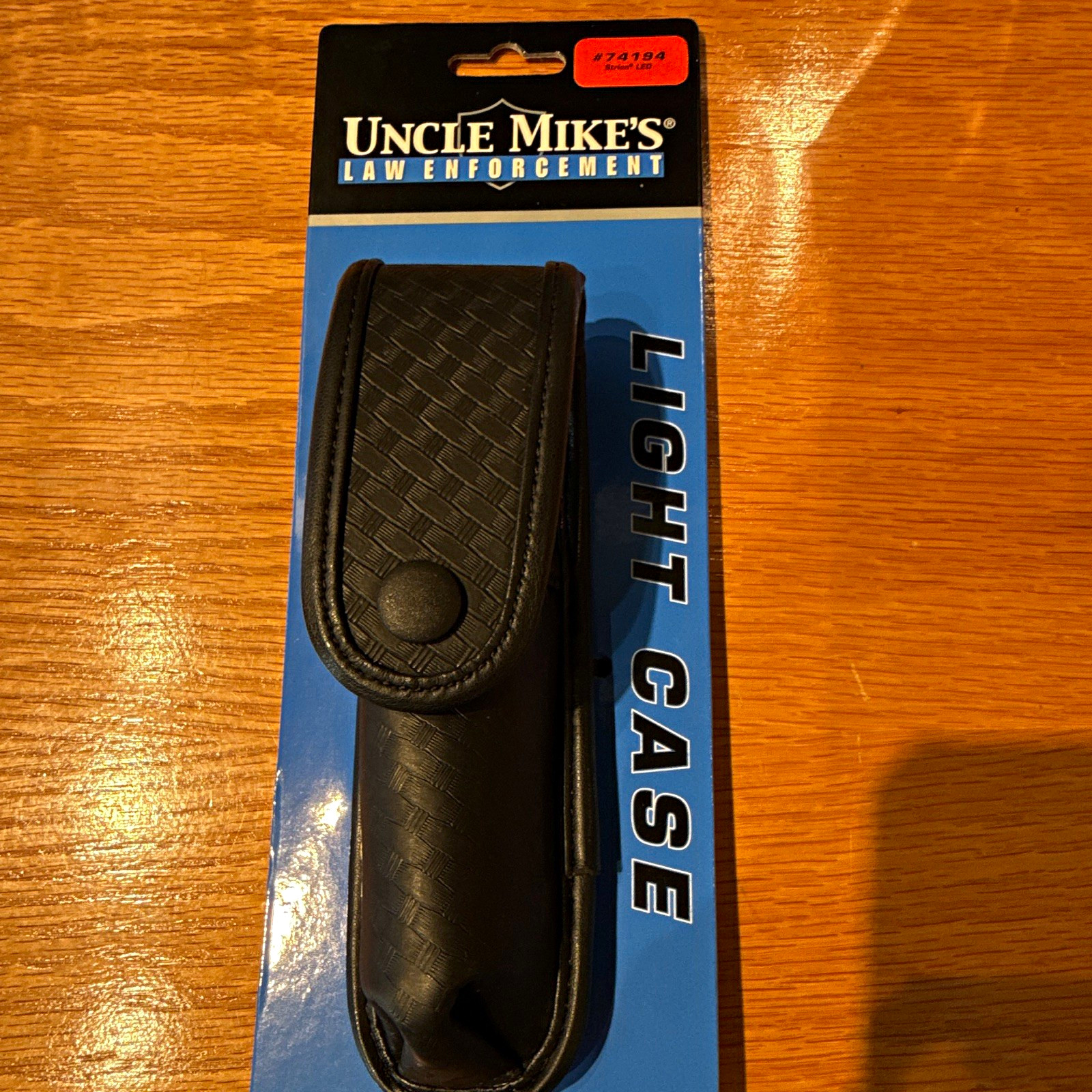 Uncle Mike's Light Case Flashlight Holder Holster Model 74194