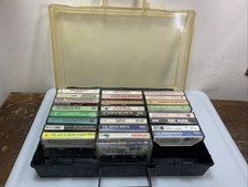 lot of 25 cassette tapes with case W/ 1 Broken Latch