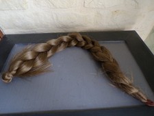Longue tresse cheveux naturel 65 cm châtain clair