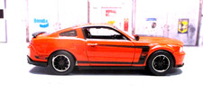 2025 Auto World 2012 Ford Mustang Boss 302 In Competition Orange New/Loose 