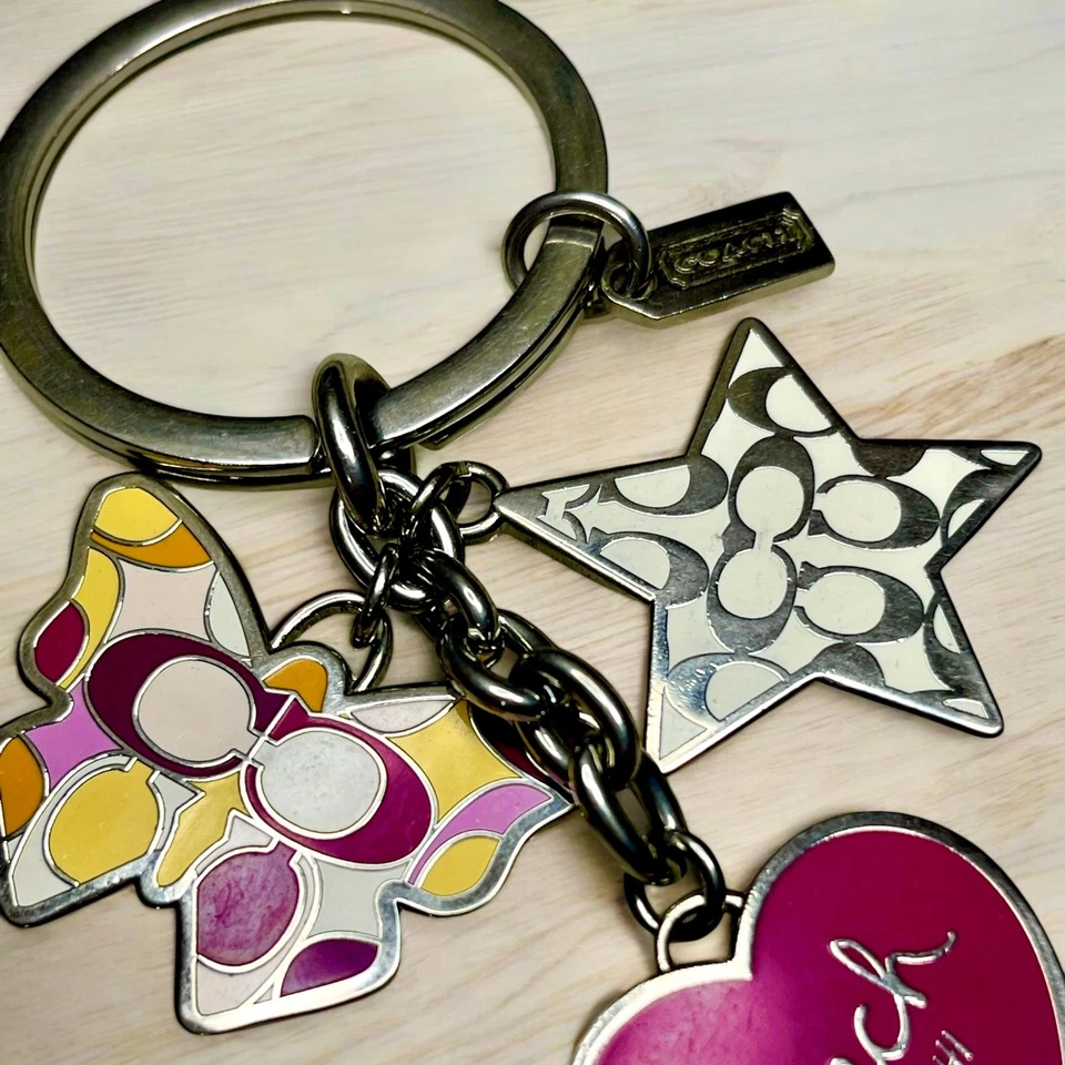 Llavero/bolsa Coach Multi Mix Mariposa encanto  Foto 3 de 3