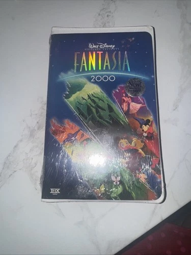 Fantasia 2000 VHS with Booklet and Original Inserts - sealed- rare! Never opened