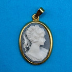 Oval Cameo Pendant Gold Tone Frame White Profile on Gray Blue Background — photo 1