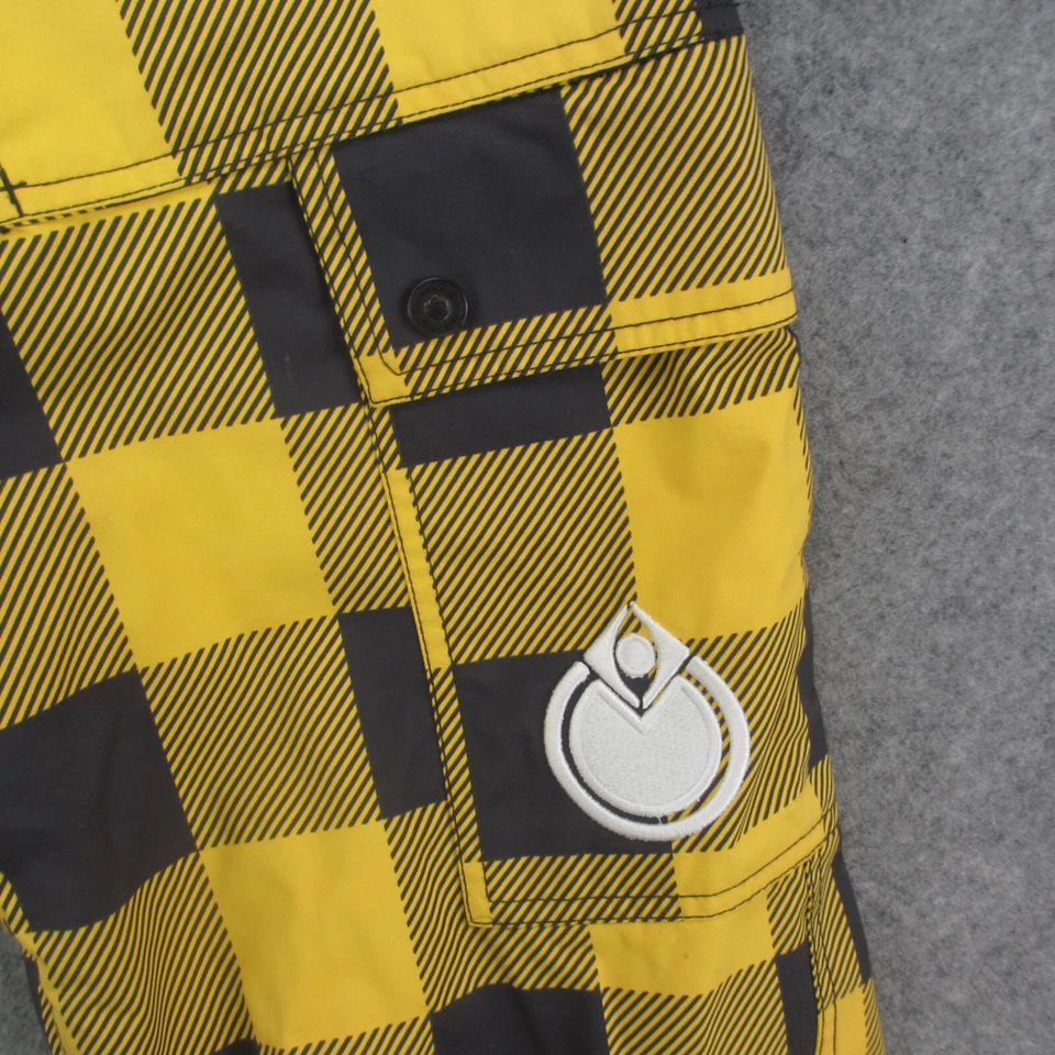 Pantalones de snowboard Nomis para hombre S amarillos a cuadros impermeables bolsillo de carga pantalones para nieve Foto 3 de 4