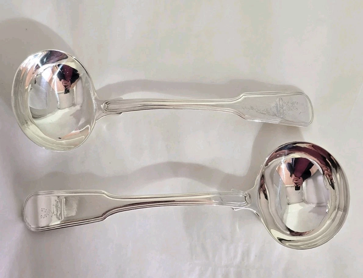 Sterling silver sauce ladles. Plain oval bowls. London 1810. By Solomon Hougham
Opens in a new windo