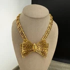 Vintage Monet Necklace Gold Tone Bow 16”