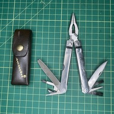 Vintage Original Leatherman TM 1325473 Multi Tool With Leather Sheath