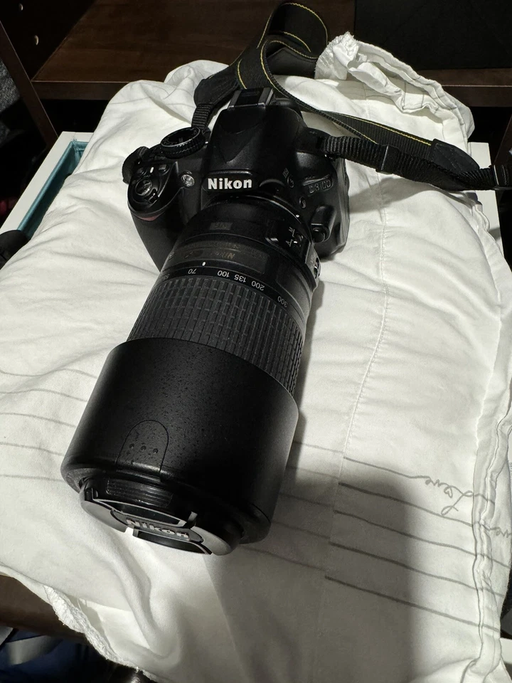 Canon D3100 con lentes zoom 55-300 mm. Foto 4 de 4