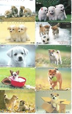 # (o) 10 versch. Japanische Telefonkarten mit Hunde-Motiven