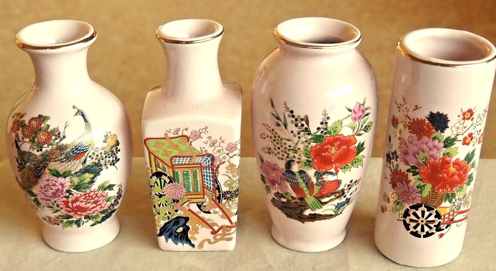 Set of 4 Asian Bud Vases Peacocks, Rickshaws, Peafowls & Floral designs.