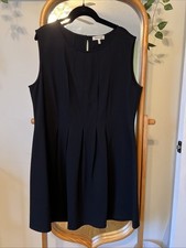 Monteau, Black Pleated A-Line with a fit and flare design Mini Dress.