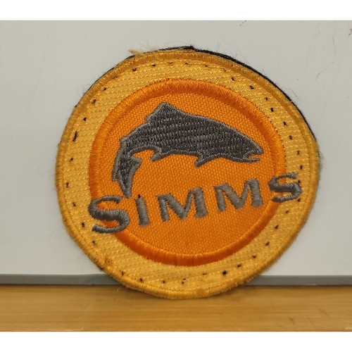 Orange Simms embroidered cloth felt back round sew-on patch 2.5” approx.