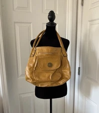 The Liz Claiborne mustard faux leather hobo shoulder bag