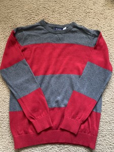 red and gray sweater