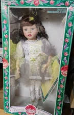 Porcelain Rose doll. 16 to 17 Inches tall.