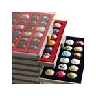 Layering drawer box for 48 champagne muzzles, beer capsules.