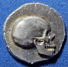 A Reckless Metals Skull 1/4 Ounce Silver Hand Pour .25 ozt