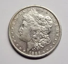 1886-O Morgan Silver Dollar – Solid AU