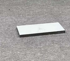 EAM150509-1-5 Tungsten Weight is 7 grams 25.4 x 12.7 x 1.5mm rectangle