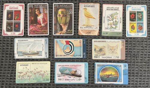 12 schede telefoniche UAE FRANCOBOLLI SERIE bandiera gatto bird flower serie carte usate - Foto 1 di 1