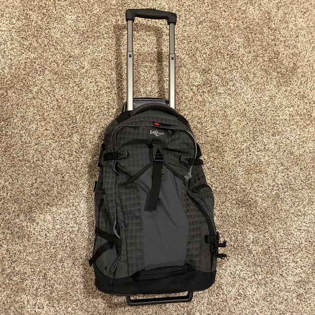 convertible carry on backpack with wheels