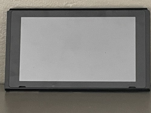 Nintendo Switch Handheld tablet with Joycons - Neon Red/Neon Blue.