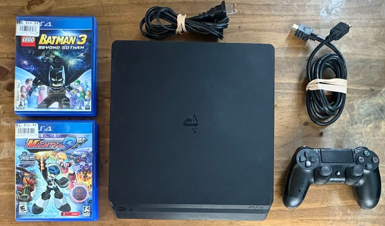 Sony PlayStation 4 Slim 1 TB Console Package in Excellent Condition with Games