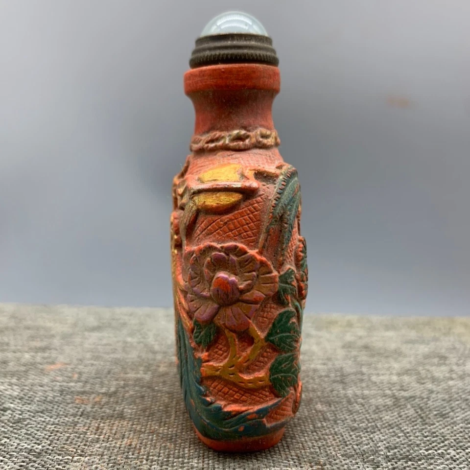 China cinabrio tallado pájaro fénix estatua pintura en botella de tabaco dorado con caja Foto 4 de 4