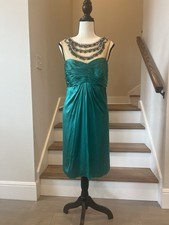 Emerald Green Sleeveless Cocktail Dress With Beaded Illusion Neckline