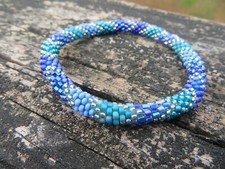 Nepal Roll On Bracelet Crochet Agave Blue Purple Clear