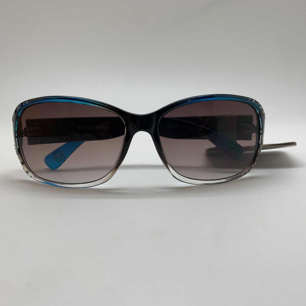 Occhiali Da Sole Panama Jack PJ 99 – Lenti Marroni Turchesi, Montatura Blu E Marrone Con Strass, Protezione UV