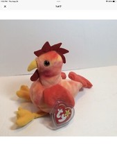 TY Beanie Baby, STRUT the Rooster. 7  , New With Tags.