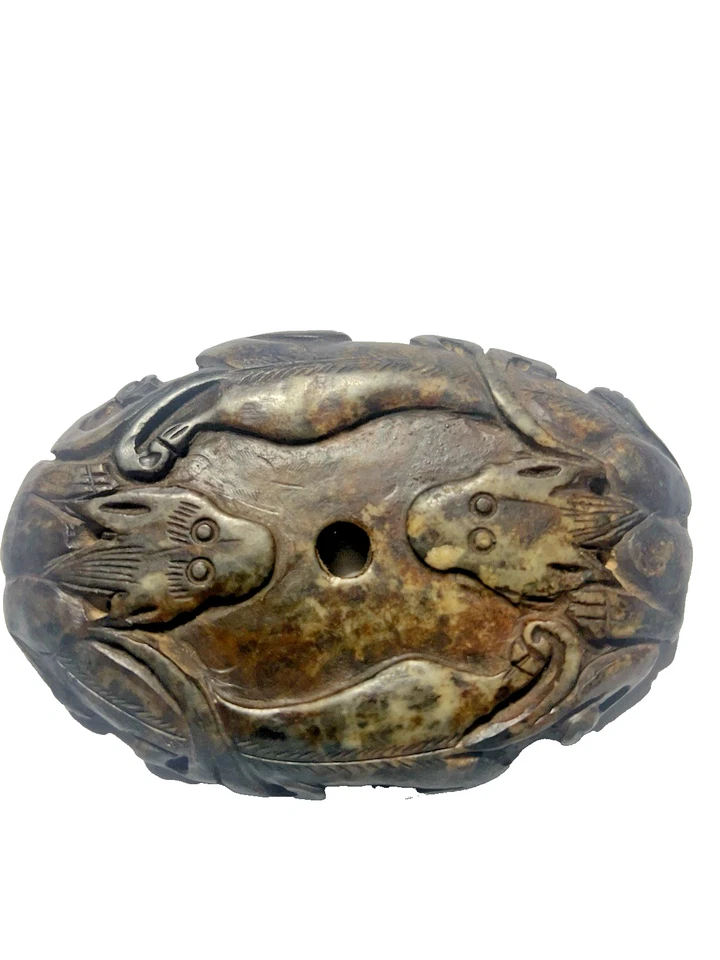 UN BIDISCO OVALADO JADE BLANCO CARBONIZADO, DINASTÍA HAN CHINA 206BC-220 AD. Foto 2 de 4