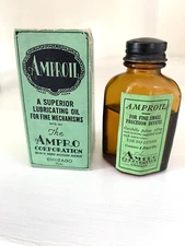 Vtg Ampro AMPROIL MOVIE Film PROJECTOR OIL 2/3 Full Amber Bottle & Box Cameras