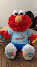 Sesame Street Learning 14" Elmo Talking Plush -Lights Music WORKS