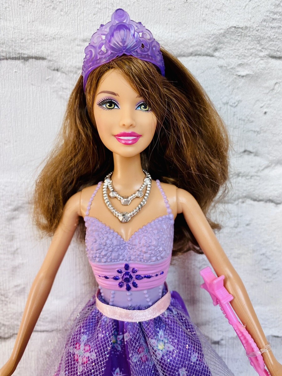 princess with purple dress and brown hair 2011 Teresa Brunette Fairytale Barbie Doll Dress, Wand or costume parties. ProductID: 89935 Azazie Cora Dress, Pearl Color:Dark Sapphire
