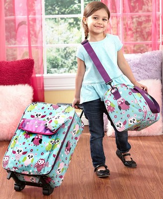 girls rolling suitcase