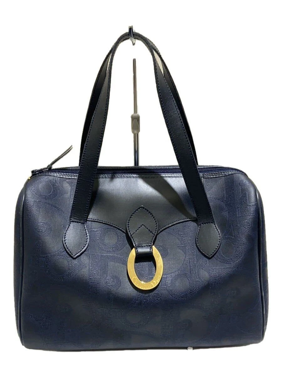 Sac à main Christian Dior carré cuir frotté bleu marine motif total occasion
