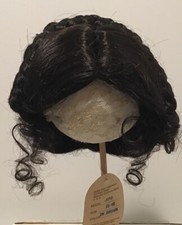 15-16  Brown Synthetic Wig - Middle Part With Braids Wrapped Over Top Of Head