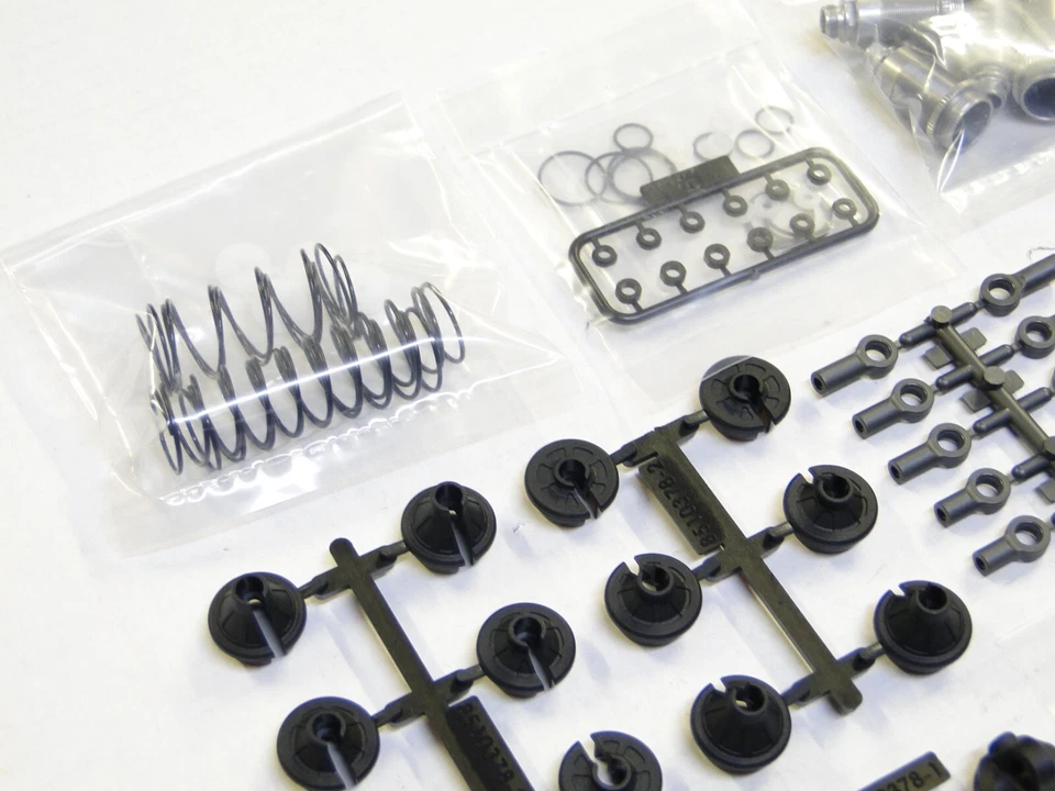 NUEVO ASOCIADO B7 B7D Juego Amortiguadores NARANJA Y GRIS B6.4 B6.3 B6.2 B6.1 AE22ND Foto 2 de 4