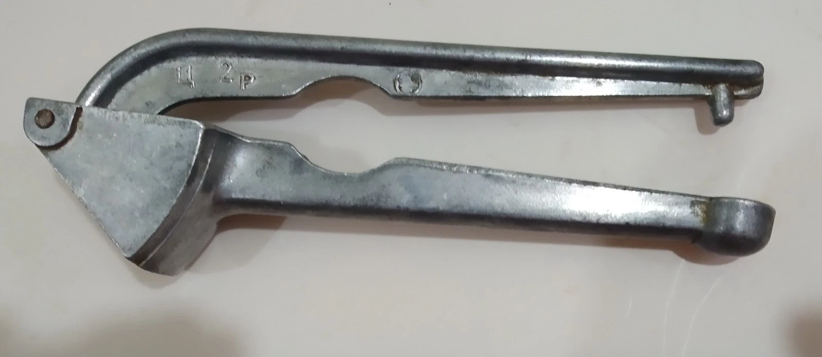 Vintage USSR garlic press from the 1970s