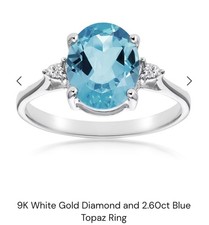 Stunning 9k White Gold diamond and 2.60ct Blue Topaz Ringring size m