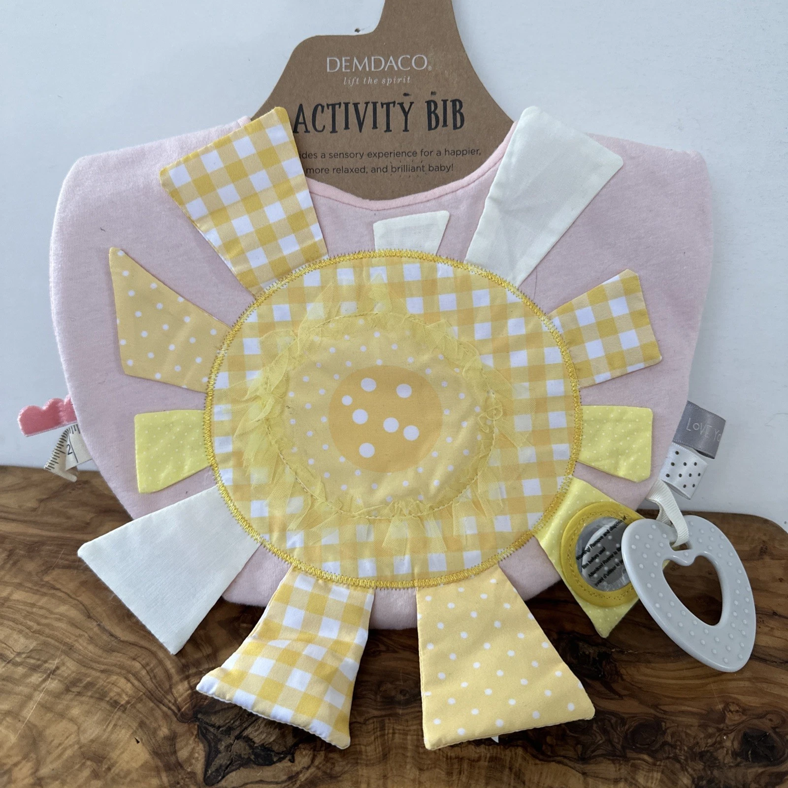 Demdaco Activity Bib Sunshine Pink Yellow Sensory Tags Heart Toy NEW With Tag