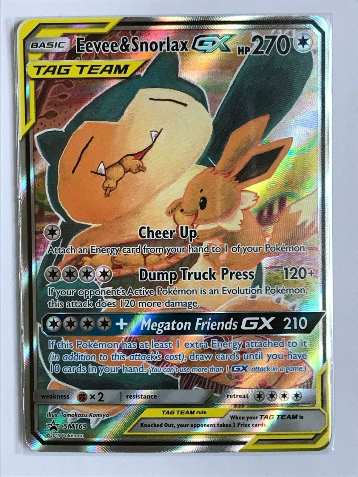 LATA POKEMON COM CARTA RARA SNORLAX E EEVEE GX 