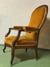 FAUTEUIL VOLTAIRE en noyer ancien à crémaillère avec 4 roulettes