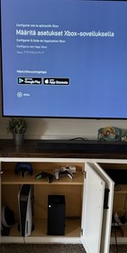 Microsoft Xbox Series X 1TB Console with two Microsoft controllers, battery pack