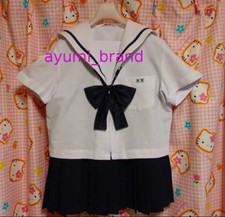 E115   Japanese SchoolGirl Uniform Summer Excellent. KK School Logo.